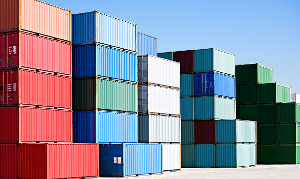 Cargo freight containers at harbor terminal stock